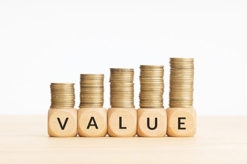 Best Value and Contra Funds - Increasing value concept with coins and blocks