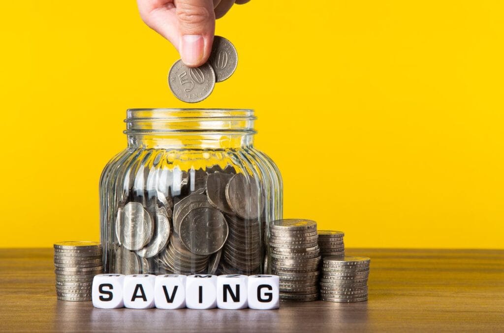 Saving money in a jar for SBI Fixed Deposit - FD calculator concept